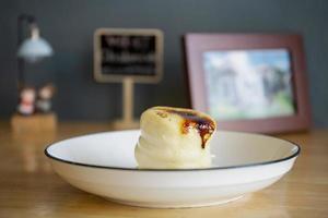 Top view, close-up, Japanese-style pancake topped with Creme. Bruleeisolated on a white background. photo