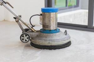 Machine for scrubbing floors to clean. photo