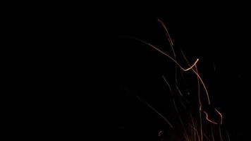 fire flames with sparks on a black background photo