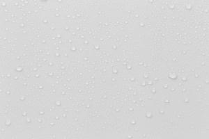 The concept of raindrops falling on a gray background Abstract wet white surface with bubbles on the surface Realistic pure water droplet water drops for creative banner design photo