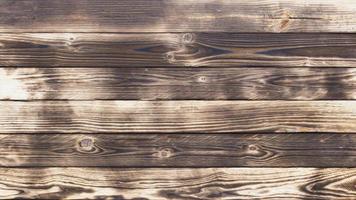 Old wood floors with traces of burnt black on abstract backgrounds and textures. photo