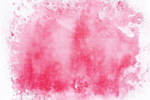 Red watercolor stains on white paper. Abstract background. photo