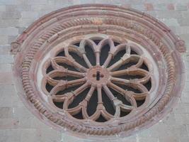 Detail of an ancient circular rose window photo