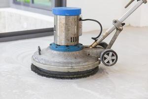 Machine for scrubbing floors to clean. photo