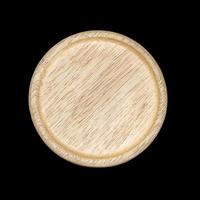 Wooden tray circle isolated on black background photo