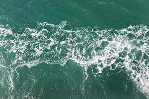 Fondo de agua de océano de burbujas de olas. foto