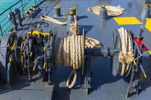 Ropes in steel wheel cages for anchorage on large tankers. photo