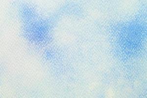 Blue watercolor on white paper, abstract background photo