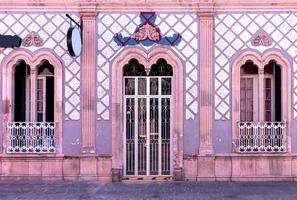 Central Mexico, Aguascalientes colorful streets and colonial houses in historic city center, one of the main city tourist attractions photo