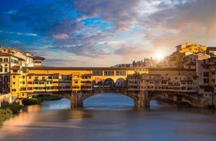 Scenic beautiful Ponte Vecchio bridge in Florence historic city center photo