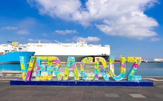 Mexico, Panoramic view of Veracruz city port wharf and cargo ships at the docks. Largest port in Mexico serving international and domestic routes photo