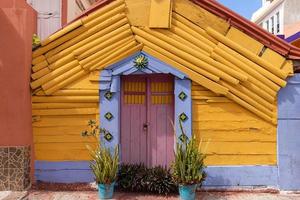 Colorful streets and scenic beaches of the Island Isla Mujeres located across the Gulf of Mexico, a short ride on the ferry from Cancun photo