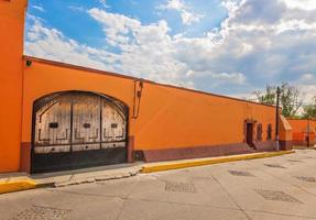 Tepotzotlan streets and colorful buildings near the central plaza photo