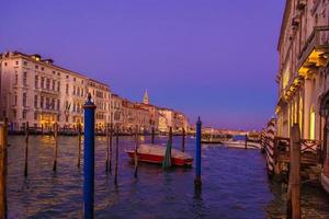 Venice Canals and gondolas around Saint Marco square at night photo