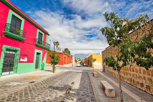 Oaxaca city, Scenic old city streets and colorful colonial buildings in historic city center photo