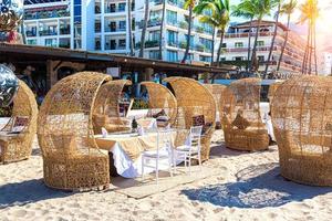 Restaurants and cafes with ocean views on Playa De Los Muertos beach and pier close to famous Puerto Vallarta Malecon, the city largest public beach photo