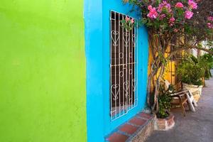 Colombia, Scenic colorful streets of Cartagena in historic Getsemani district near Walled City, Ciudad Amurallada, a UNESCO world heritage site photo