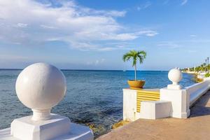 San Miguel de Cozumel, Mexico, sea Malecon route with sculptures and scenic ocean views going along the ocean shore photo