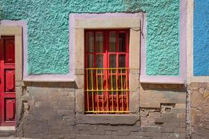 Scenic cobbled streets and traditional colorful colonial  architecture in Guanajuato historic city center photo