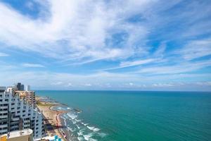 Colombia, scenic view of Cartagena beaches and playas at sunset near historic city center and resort hotel zone photo