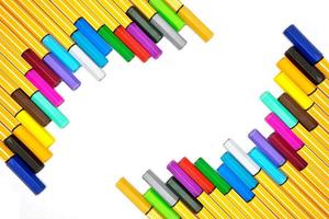 Colorful pens on isolated white background photo