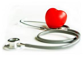 A heart with a stethoscope lying photo