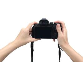 Holding camera with isolated background photo