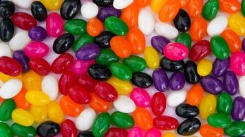 Colorful jelly beans candy background photo