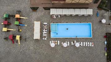 Swimming Pool viewed from above. Top down view photo