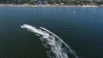 Aerial view of jet ski in the ocean photo