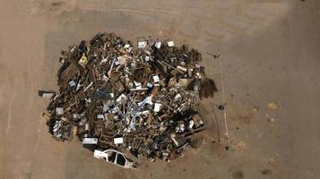 a pile of garbage from scrap metal top view aerial photography from a drone photo