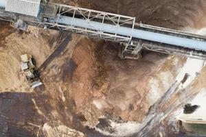 excavator at a woodworking factory top view photo