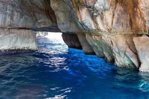 beautiful view of the rock in the sea in Malta. water of turquoise and blue photo