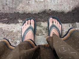 27 March 2022 in Cianjur Regency, West Java, Indonesia. Flip-flops.  Photo illustration of poverty and simplicity.