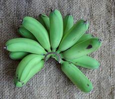 Organic green bananas photo