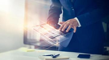 Digital marketing. Businessman using modern interface payments online shopping and icon customer network connection on virtual screen. Business innovation technology concept photo