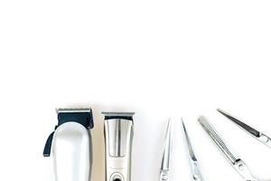 A set of hair cut tools on white background for cutting barber beard salon photo