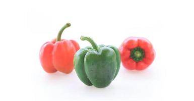 Fresh sweet  peppers isolated on white background. Colorful bell peppers on white background photo