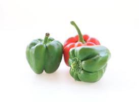 Fresh sweet  peppers isolated on white background. Colorful bell peppers on white background photo