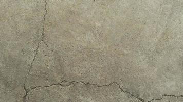 old cracked concrete. Grunge concrete cement wall with crack, for your design and background texture. stone walkway. concrete texture photo