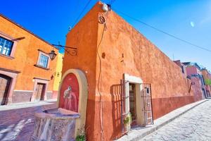 Colorful buildings and streets of San Miguel de Allende in historic city center photo