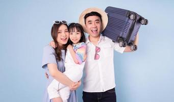 Image of young Asian family travel concept background photo