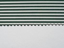 striped dark green and white cotton fabric texture background photo