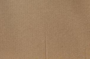 dark brown corrugated cardboard texture background photo
