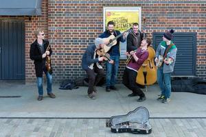 LONDON, UK, 2018. Group of Men Busking on the Southbank photo