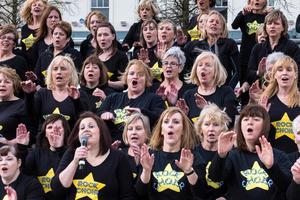 Cardiff, Wales, UK, 2014. The Rock Choir Supporting Sport Relief Day and Entertaining the Crowds photo