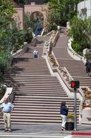 LOS ANGELES, CALIFORNIA, USA, 2011. Street scene by steps in Los Angeles, California, USA on July 28, 2011. Four unidentified people. photo