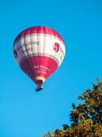 Bath, Somerset, UK, 2016. Hot Air Balloon Flying over Bath photo