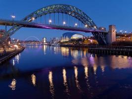 NEWCASTLE UPON TYNE, TYNE AND WEAR, UK, 2018. View of the Tyne and Millennium Bridges at dusk in Newcastle upon Tyne, Tyne and Wear on January 20, 2018 photo