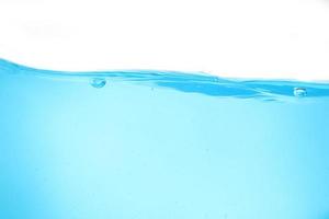 Blue surface water and air bubble isolated on white background photo